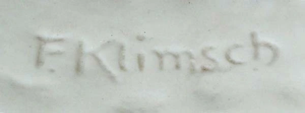 In hellem Material vertiefter Namenszug F. Klimsch.